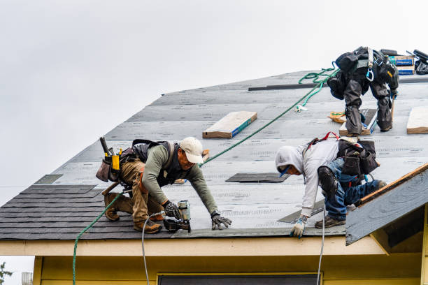Professional Gutter Installation technician working in Rosemont, PA
